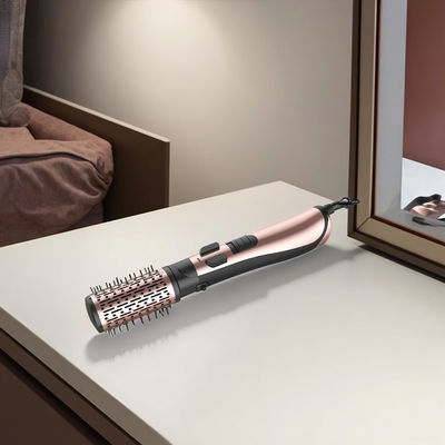 간편한 스타일링을 위한 3단계 온도 조절 및 220~240V 전압의 1200W 파워 헤어 드라이어 브러쉬